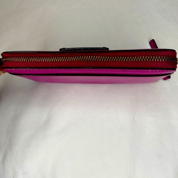 Leather Zip Around Wallet by Kate Spade in magenta.

Length: 7.75",  Height: 4" - Picture 3 of 6